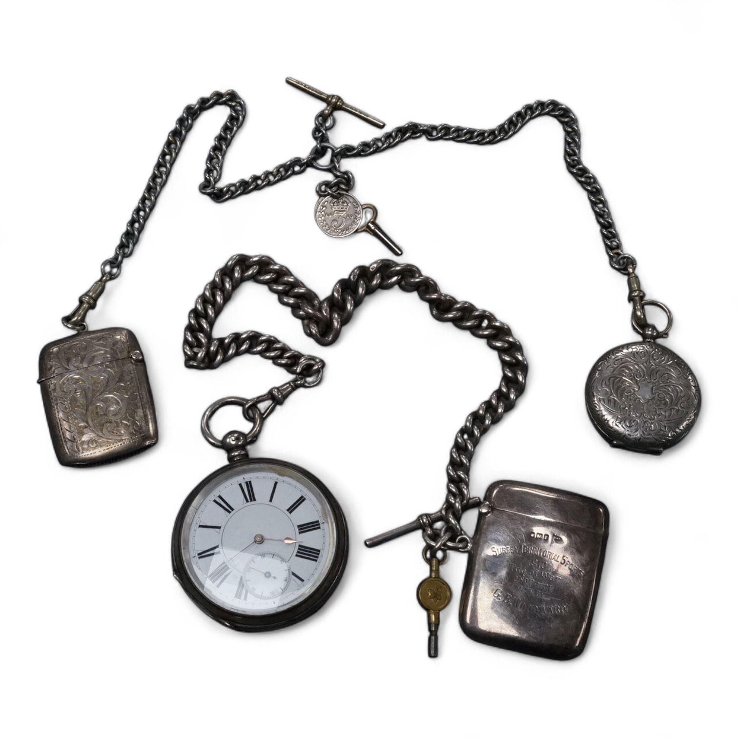 A late Victorian silver open faced key wind pocket watch, with Roman dial and subsidiary seconds, case diameter 52mm, on a heavy silver curb link albert, hung with a silver vesta case and a watch key, together with a con
